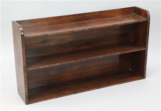 A Regency rosewood wall shelf with brass stringing and paterae inlay, W.3ft 1in. D.7.5ins H.1ft 8in.